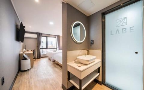 Family Twin Room, 2 Queen Beds, Non Smoking, City View | Premium bedding, memory foam beds, individually decorated