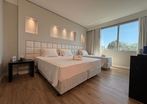 Deluxe Double or Twin Room | In-room safe, desk, laptop workspace, blackout drapes