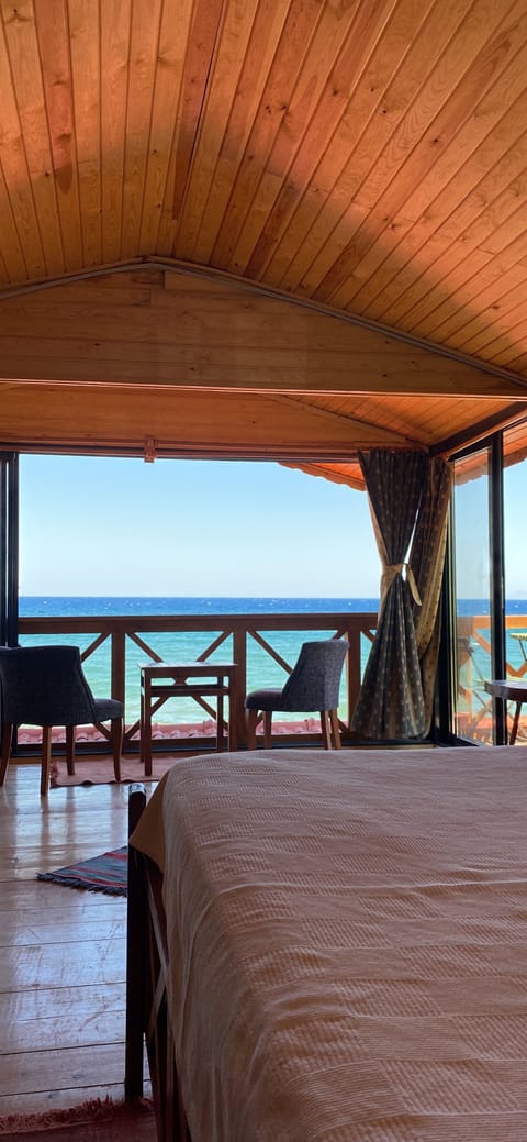 Honeymoon Tree House, Lanai, Sea View | Desk, laptop workspace, free WiFi, bed sheets