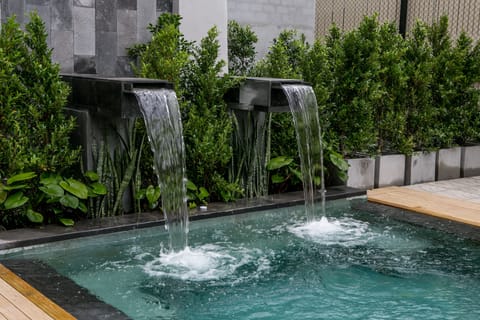 Outdoor pool, pool umbrellas, sun loungers