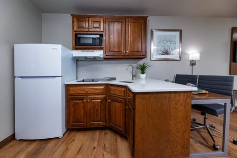 Executive Suite, 2 Bedrooms | Private kitchen | Full-size fridge, microwave, stovetop, coffee/tea maker