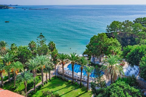 Indoor pool, seasonal outdoor pool, pool umbrellas, sun loungers