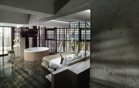 Deluxe Suite with Hot Tub & Sea View | Minibar, in-room safe, desk, soundproofing