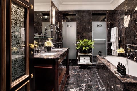 Designer toiletries, hair dryer, bathrobes, slippers