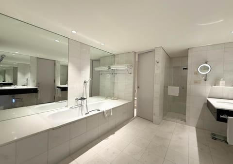 Executive Suite | Bathroom | Designer toiletries, hair dryer, bathrobes, slippers