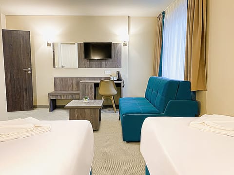 Desk, laptop workspace, free WiFi, bed sheets