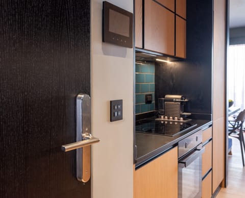 City Experience Suite | Private kitchenette | Mini-fridge, coffee/tea maker, electric kettle, toaster