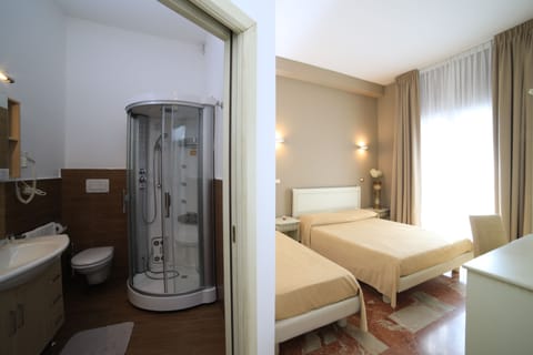 Double Room | Minibar, in-room safe, individually decorated, individually furnished