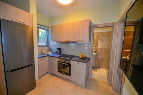 Villa | Private kitchen | Full-size fridge, microwave, oven, stovetop