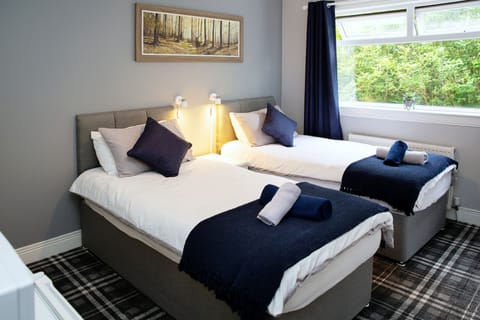 Twin Room | Blackout drapes, iron/ironing board, free WiFi, bed sheets