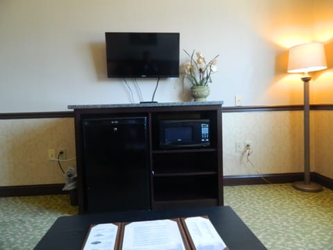 Superior Suite, 1 King Bed, Jetted Tub | Living area | Flat-screen TV