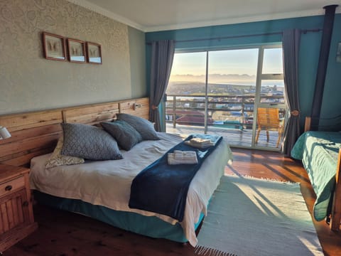 Cape Blue  | Premium bedding, in-room safe, individually decorated, desk