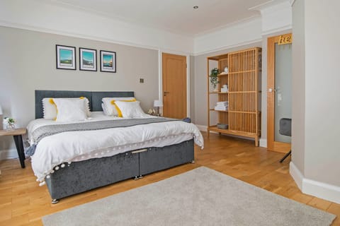 Individually decorated, desk, blackout drapes, iron/ironing board