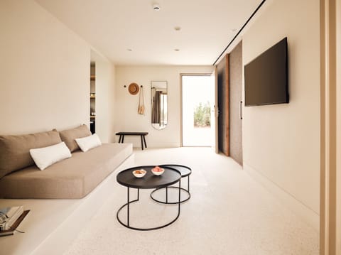 Harmonia Junior Balcony Suite | Living area | 40-inch Smart TV with satellite channels, TV