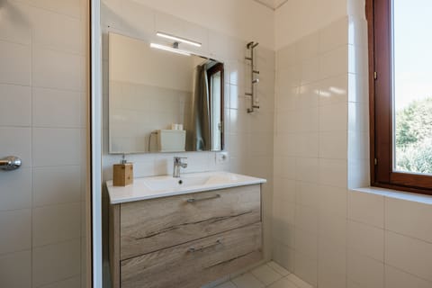 Apartment, 2 Bedrooms | Bathroom | Shower, hair dryer, bidet, soap