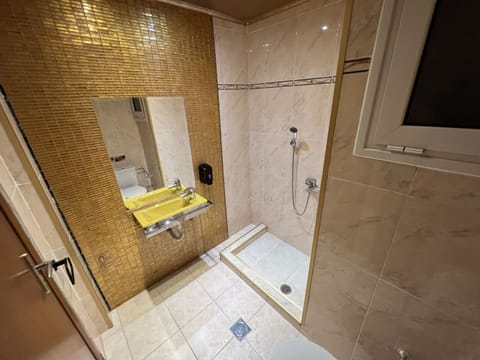 Shower, free toiletries, hair dryer, bathrobes