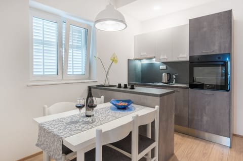 Comfort Apartment, 1 Bedroom, Balcony, Courtyard View | Private kitchen | Fridge, electric kettle, blender, cleaning supplies