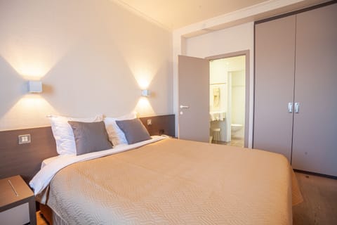 Classic Double Room | Living area | Flat-screen TV