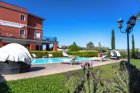 Outdoor pool, open 10:30 AM to 7:30 PM, sun loungers