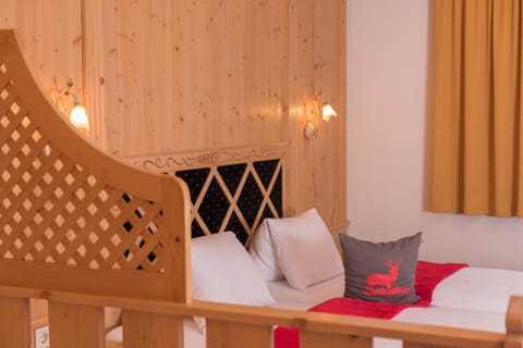 Desk, laptop workspace, free WiFi, bed sheets