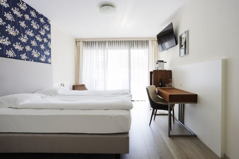 Superior Double Room | Down comforters, minibar, desk, laptop workspace