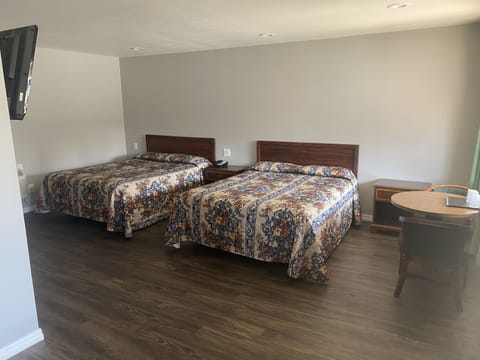 Deluxe Room, 2 Queen Beds, Non Smoking | Desk, free WiFi, bed sheets