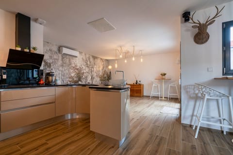 Deluxe Double Room | Living area | 80-cm flat-screen TV with digital channels, TV