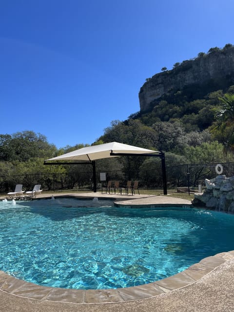 Outdoor pool, pool umbrellas, sun loungers