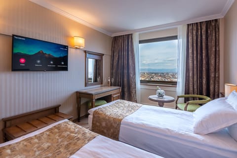 Desk, laptop workspace, free WiFi, bed sheets