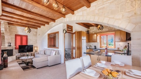 Villa | Living area | 50-inch Smart TV with digital channels, TV, fireplace