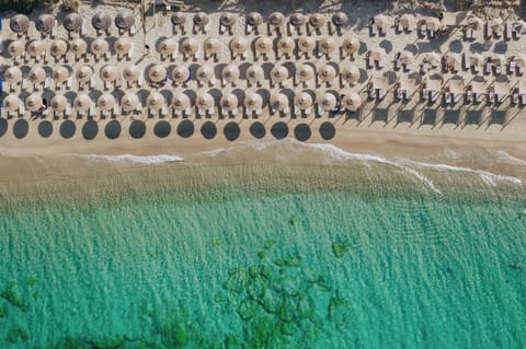 On the beach, sun loungers, beach umbrellas, beach massages