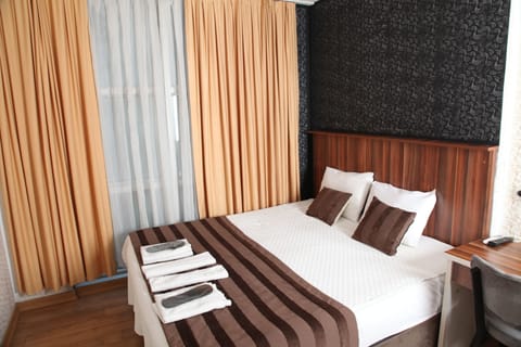 Deluxe Room, 2 Bedrooms | Premium bedding, minibar, desk, blackout drapes