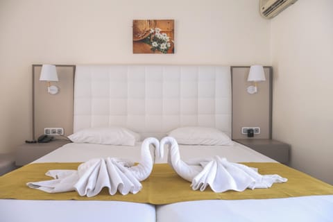 Premium bedding, in-room safe, blackout drapes, soundproofing