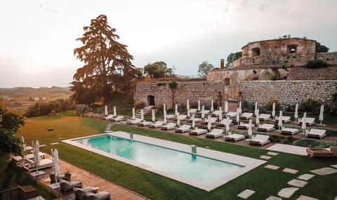 Outdoor pool, open 9:00 AM to 7:30 PM, sun loungers