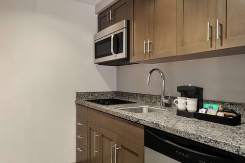 Studio Suite, 1 King Bed with Sofa bed | Private kitchen | Full-size fridge, microwave, stovetop, dishwasher