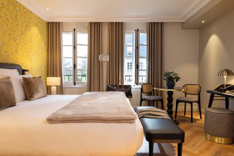 Deluxe Room, Garden View with SPA Access | In-room safe, desk, blackout drapes, soundproofing