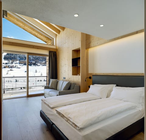 Premium bedding, down comforters, memory foam beds, minibar