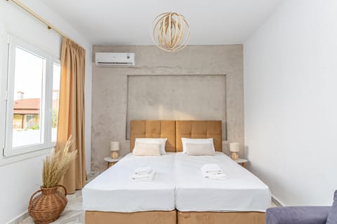 Junior Triple Room, 1 King Bed with Sofa bed, Lanai, Garden View | In-room safe, desk, free WiFi