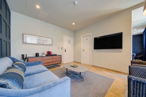 Executive Room | Living area | Flat-screen TV