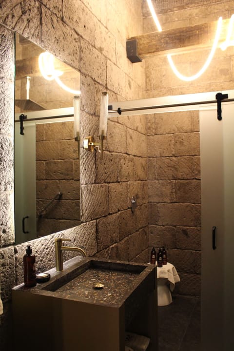 Master Suite King | Bathroom | Shower, rainfall showerhead, hair dryer, bathrobes