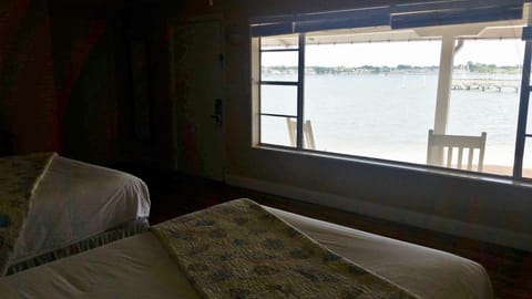 Signature Room, 2 Double Beds, Patio, Bay View | Down comforters, desk, iron/ironing board, free WiFi