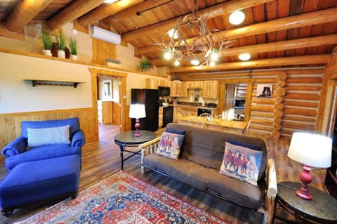Cabin, 2 Bedrooms | Living area | 50-inch LED TV with digital channels, streaming services