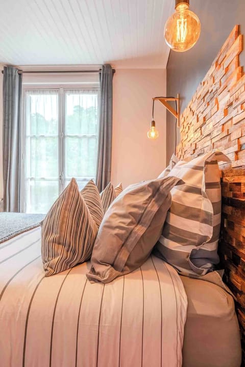 The Atelier/ Superior suite with double to quadruple occupancy featuring a dining area | Premium bedding, individually decorated, individually furnished, desk