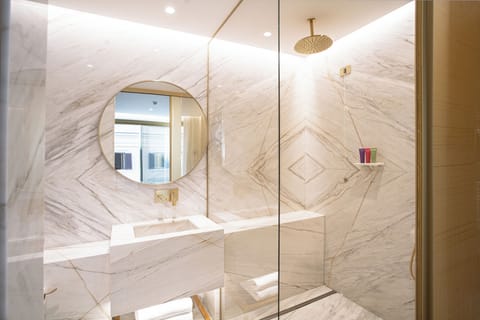 Shower, rainfall showerhead, designer toiletries, hair dryer