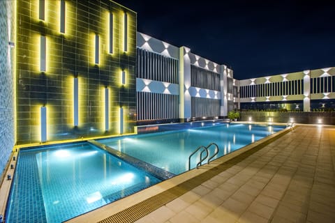 Outdoor pool, open 8:00 AM to 8:00 PM, pool umbrellas, sun loungers
