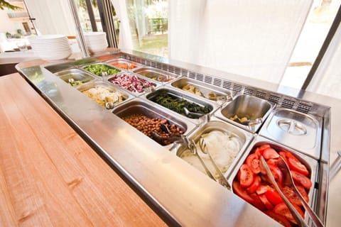 Breakfast, lunch, dinner served; local cuisine, alfresco dining 