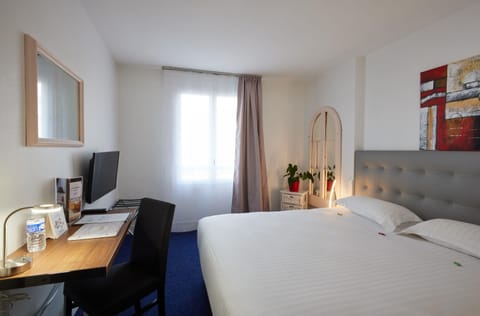 Premium bedding, desk, laptop workspace, iron/ironing board