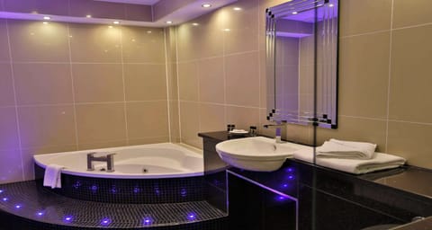 Suite, 1 Double Bed, Non Smoking | Desk, laptop workspace, iron/ironing board, free WiFi