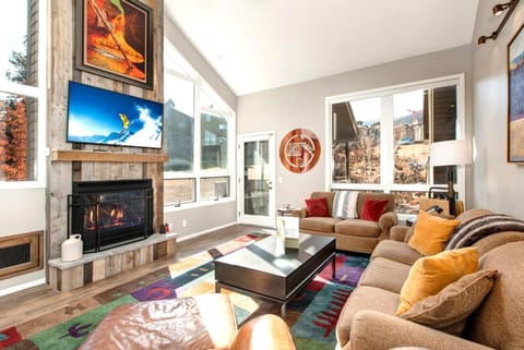 Townhome (4 Bedrooms) | Living area | TV, fireplace, DVD player