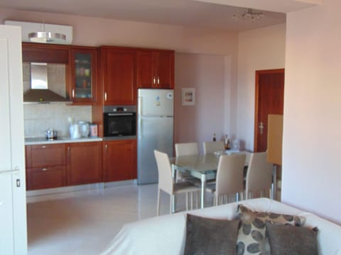 Comfort House, 1 Bedroom, Balcony, Beachfront | Living area | 42-inch flat-screen TV with digital channels, TV, fireplace